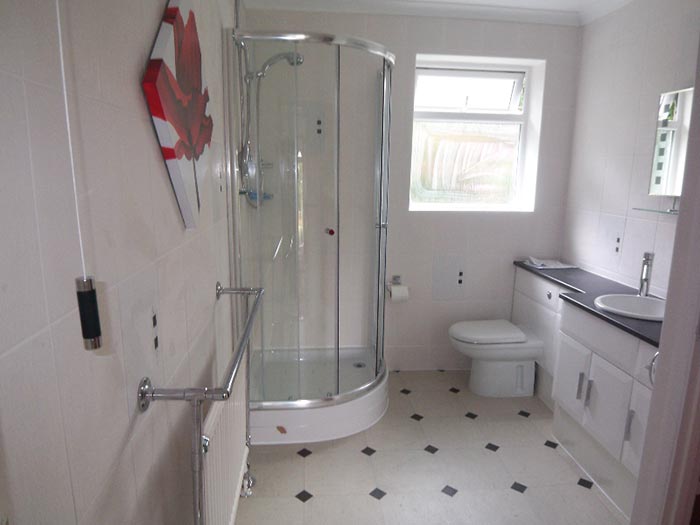 Shower room with curved shower